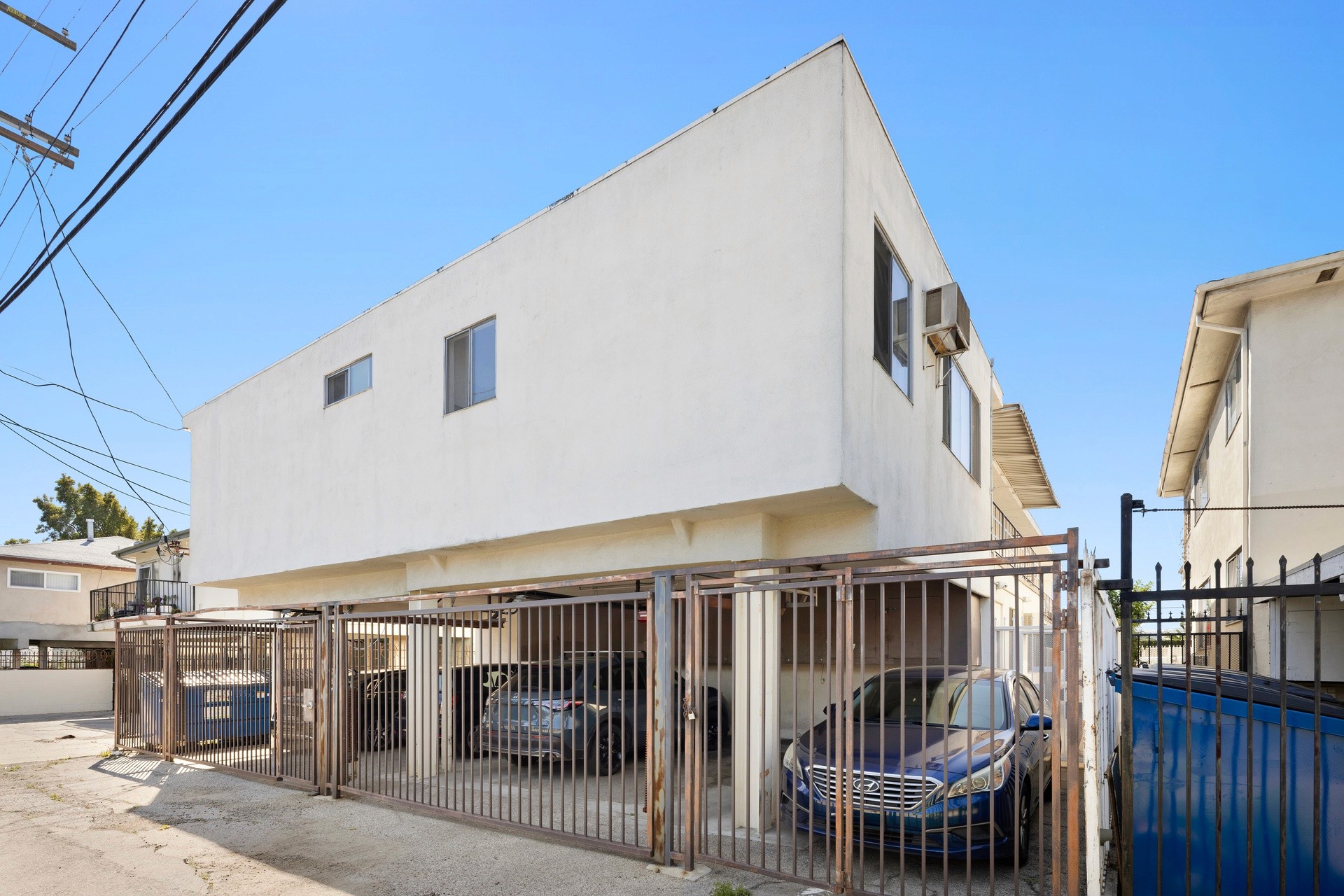 Rear gated parking area at 1336 n citrus ave multifamily investment property.