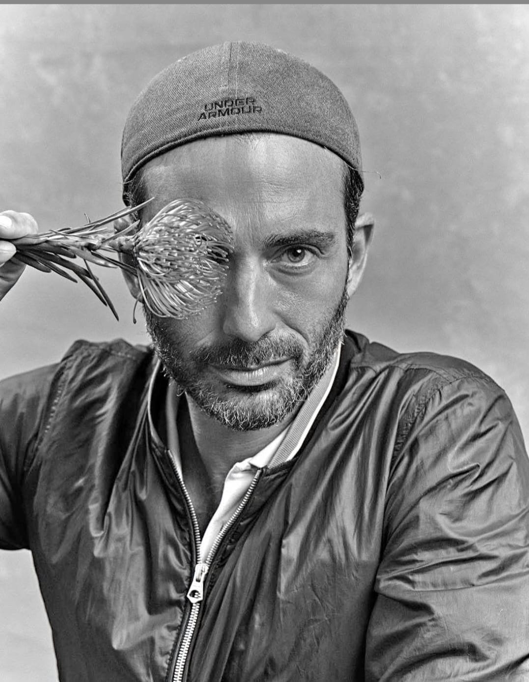 Portrait of Olivier Wartowski, blurred black-and-white editorial photograph