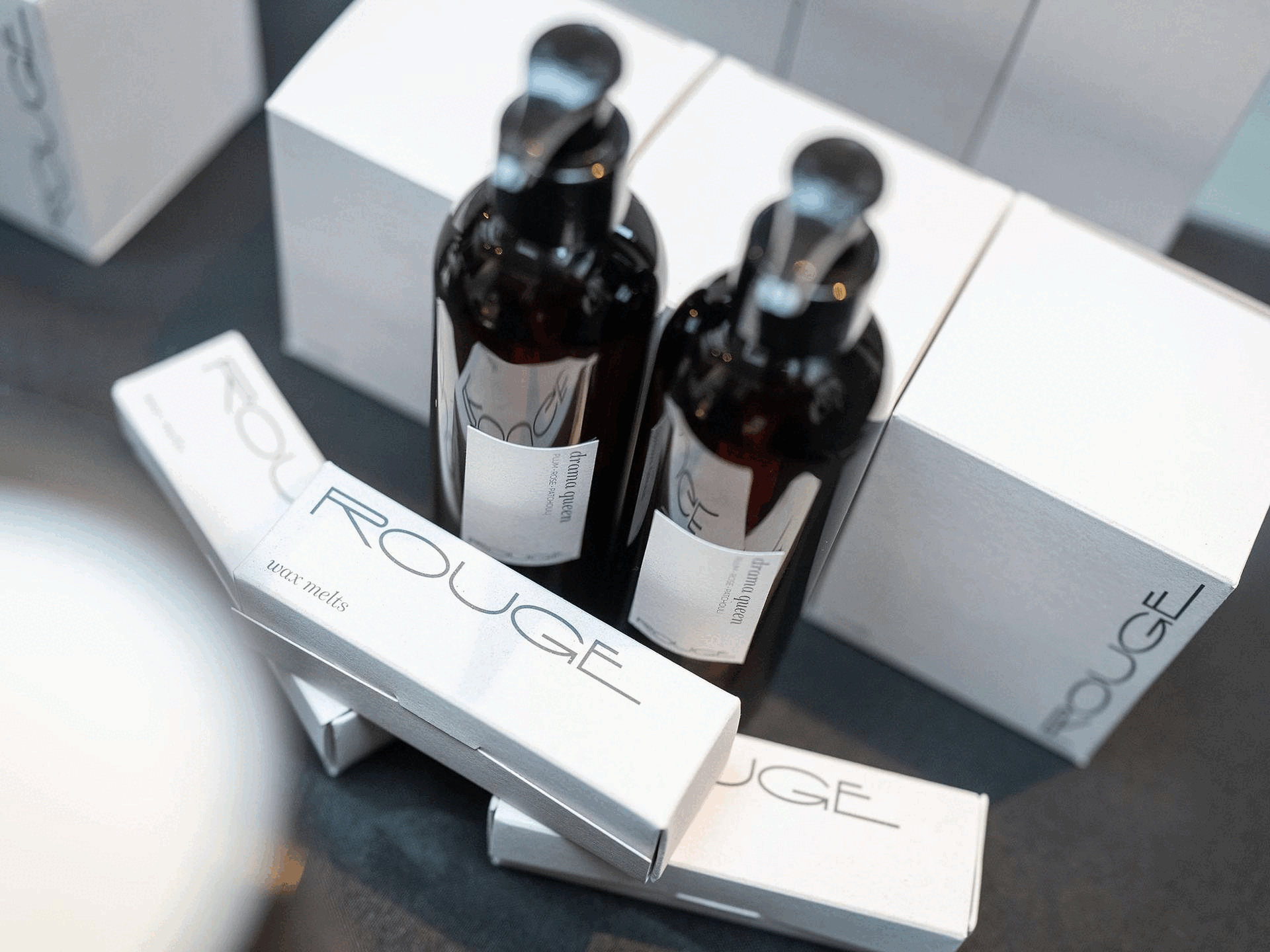 shots of fragrance products - candles, diffusers, handcreams