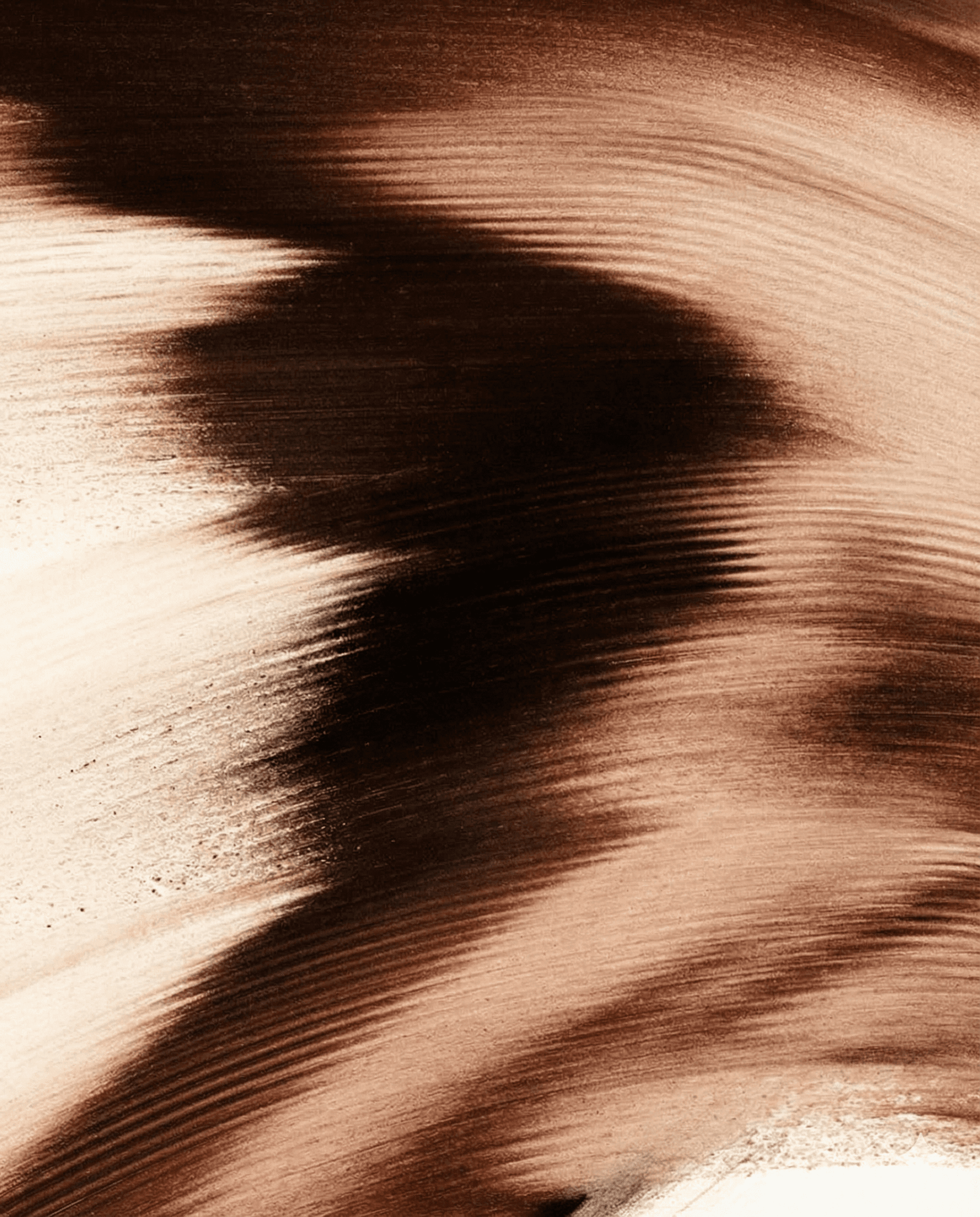 A group of six people poses on a city street, with buildings and shops visible in the background.