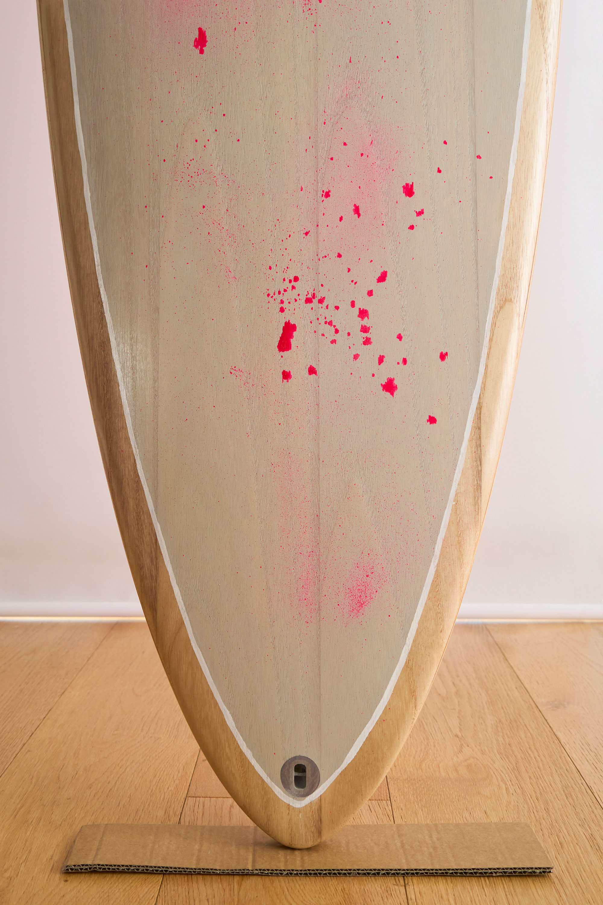 Mid length timber surfboard tail