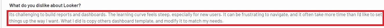 Looker user review describing a steep learning curve and challenges in building dashboards