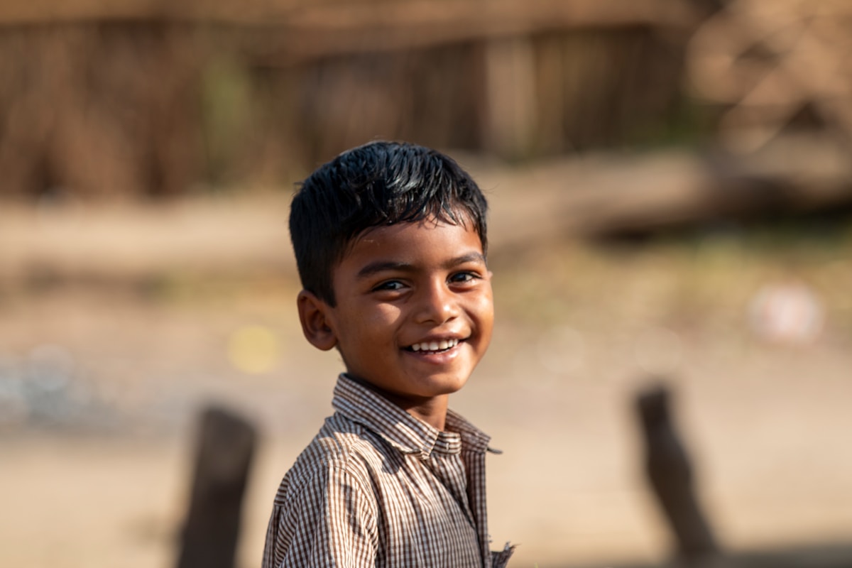 Indian child smiling warmly for special care