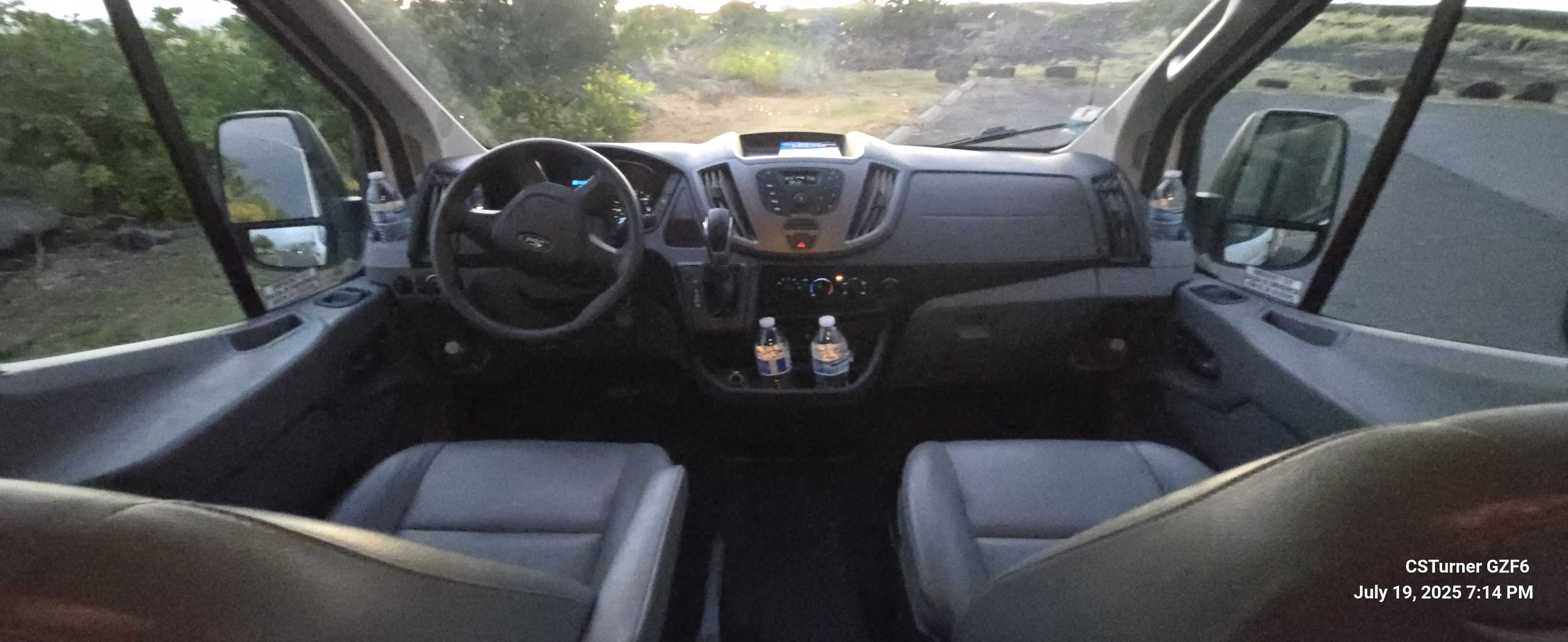 White Ford Transit XLT 15 Passenger Van Hawaii Big Island Sunset For Rent