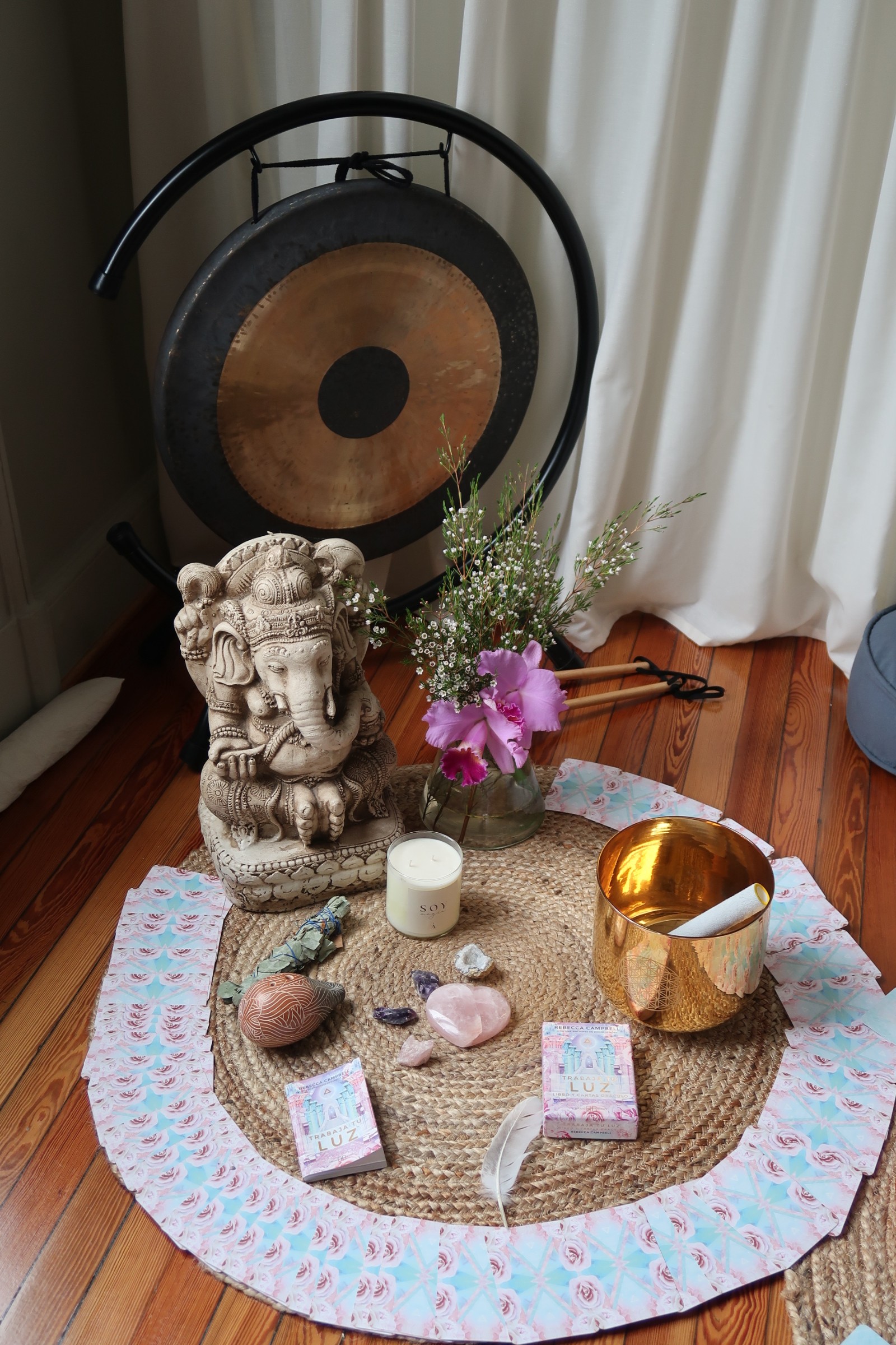 Two people doing a side stretch pose on yoga mats