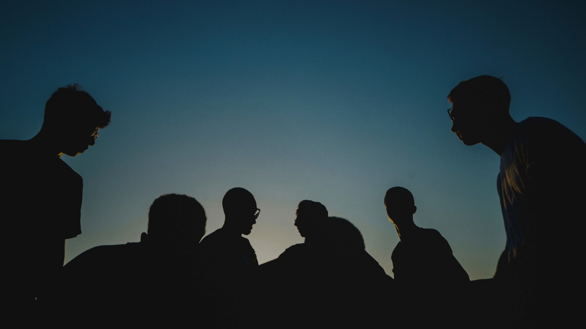 woman's face on black background