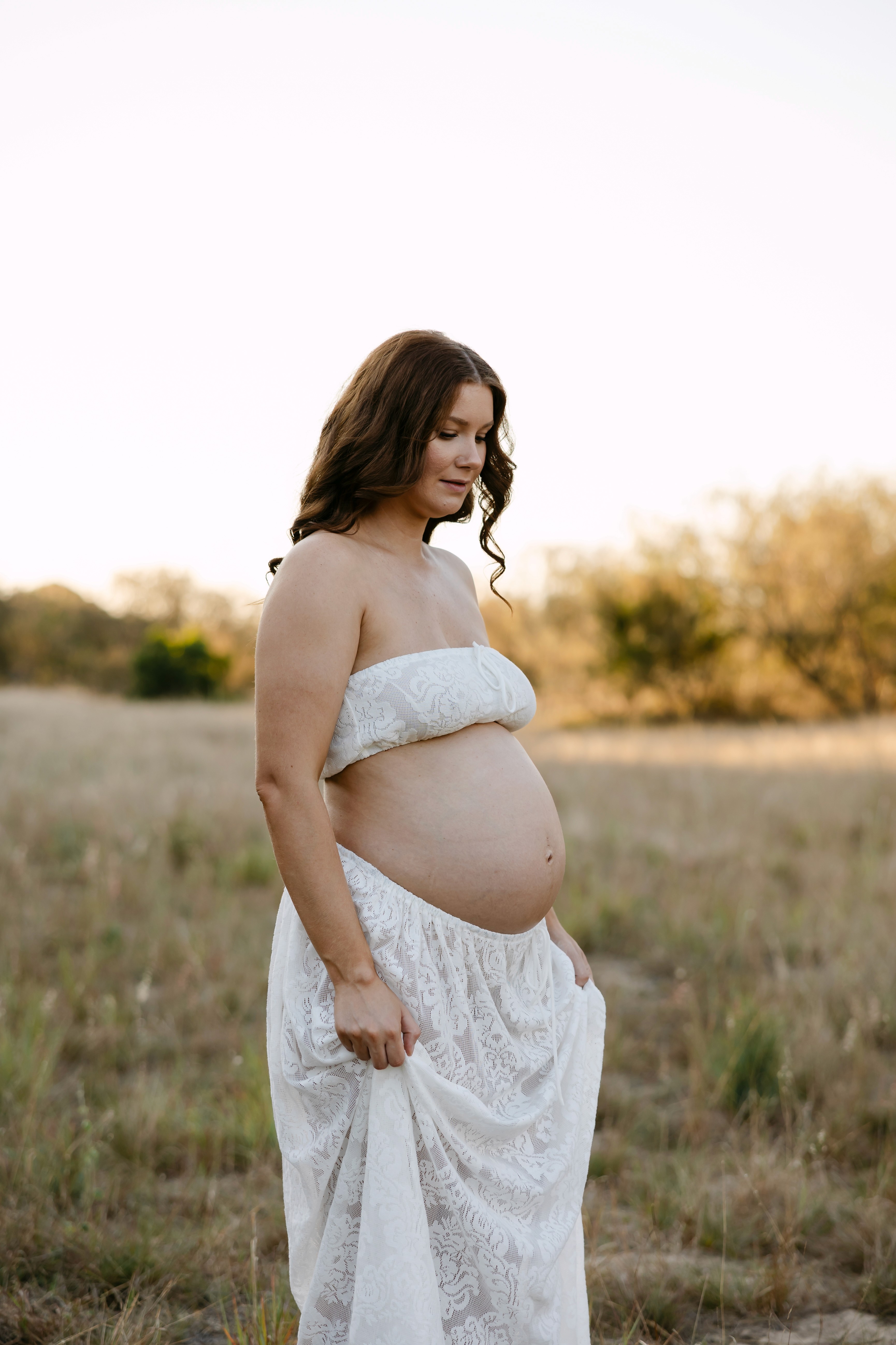 Maternity photo of pregnant mother at the beach in Mackay QLD