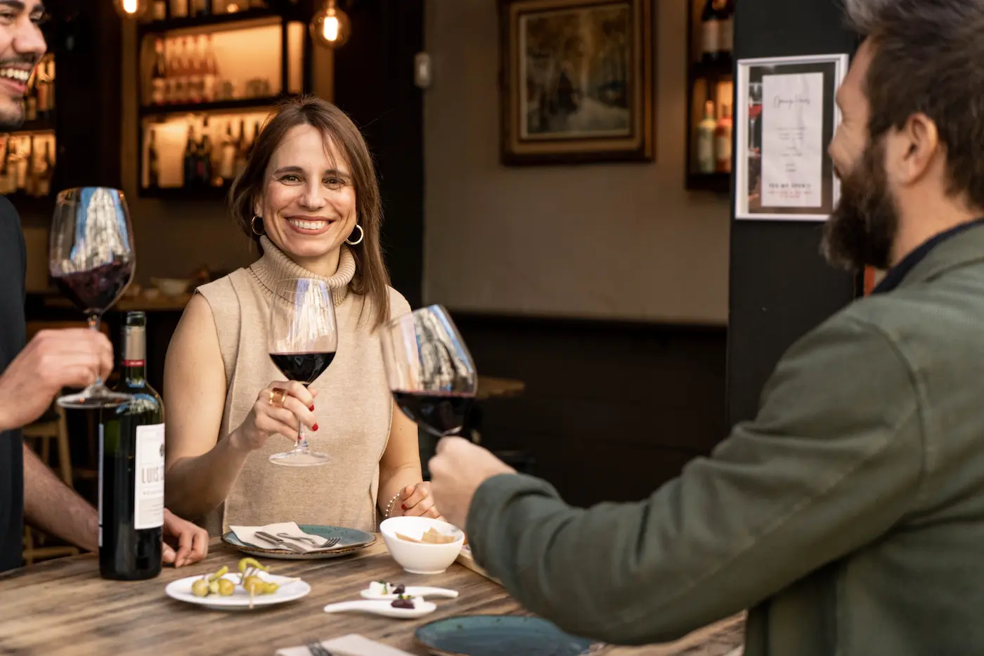 Guests enjoying a sommelier-led wine tasting during a Barcelona food and wine tour.