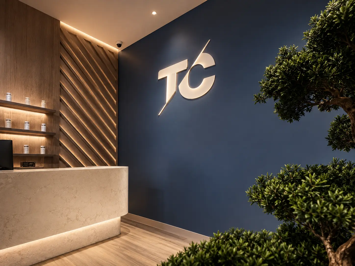 Clinic reception with the T Clinics USA logo on a dark wall