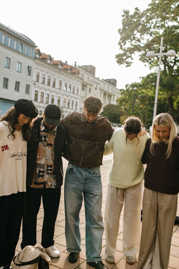 man in black and red shirt reading book