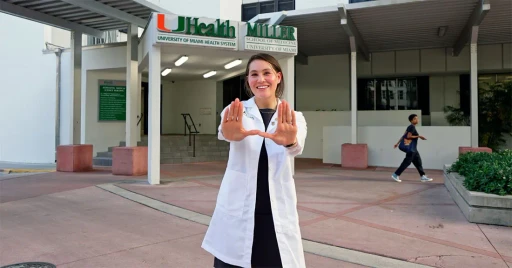person wearing black watch holding black camera
