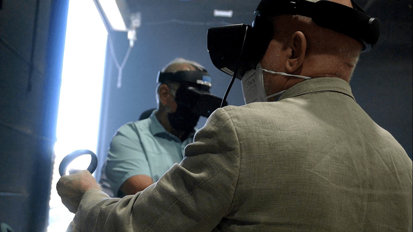 Two cinematographers testing the Unreal Engine set in VR.