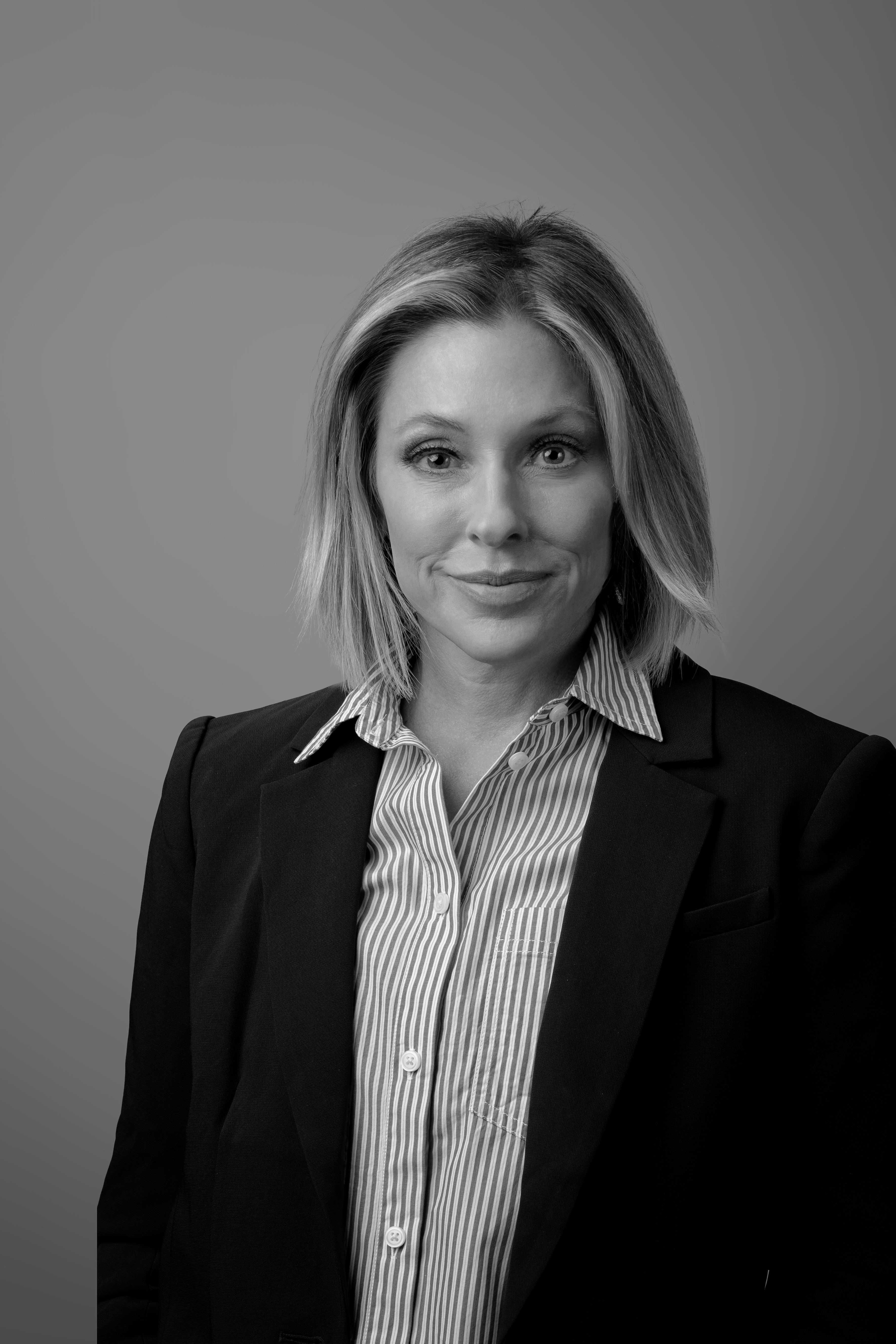 Black and white profile photo of April Roberts