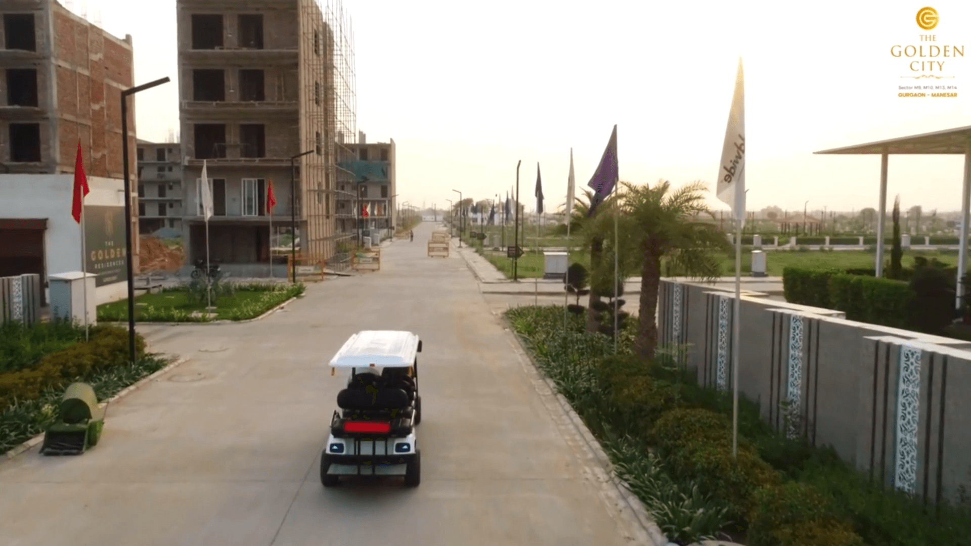 Modern luxury villa with infinity pool at sunset with tree.