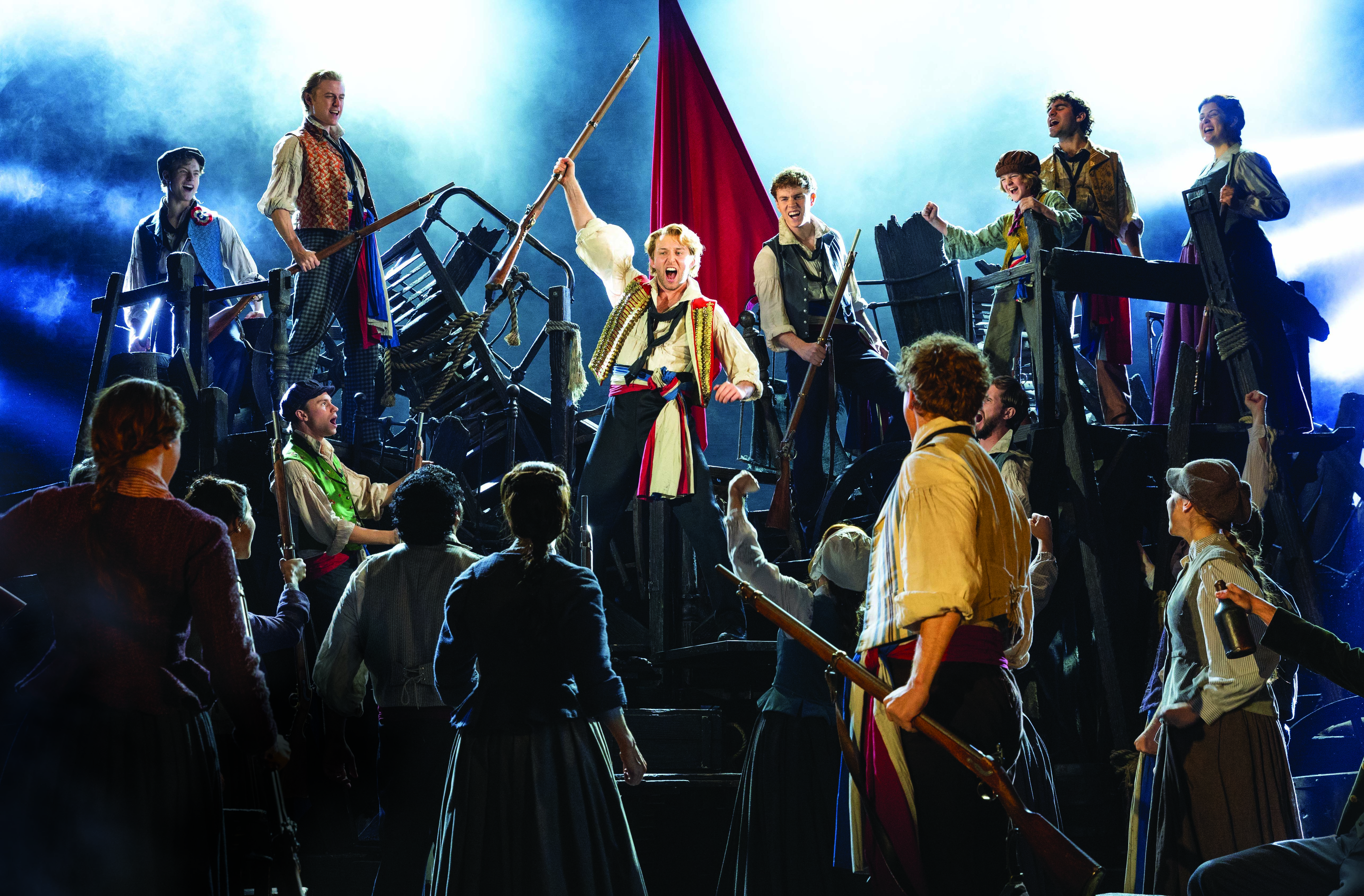 Robson Broad as 'Enjolras' and Cast. Photo by Danny Kaan