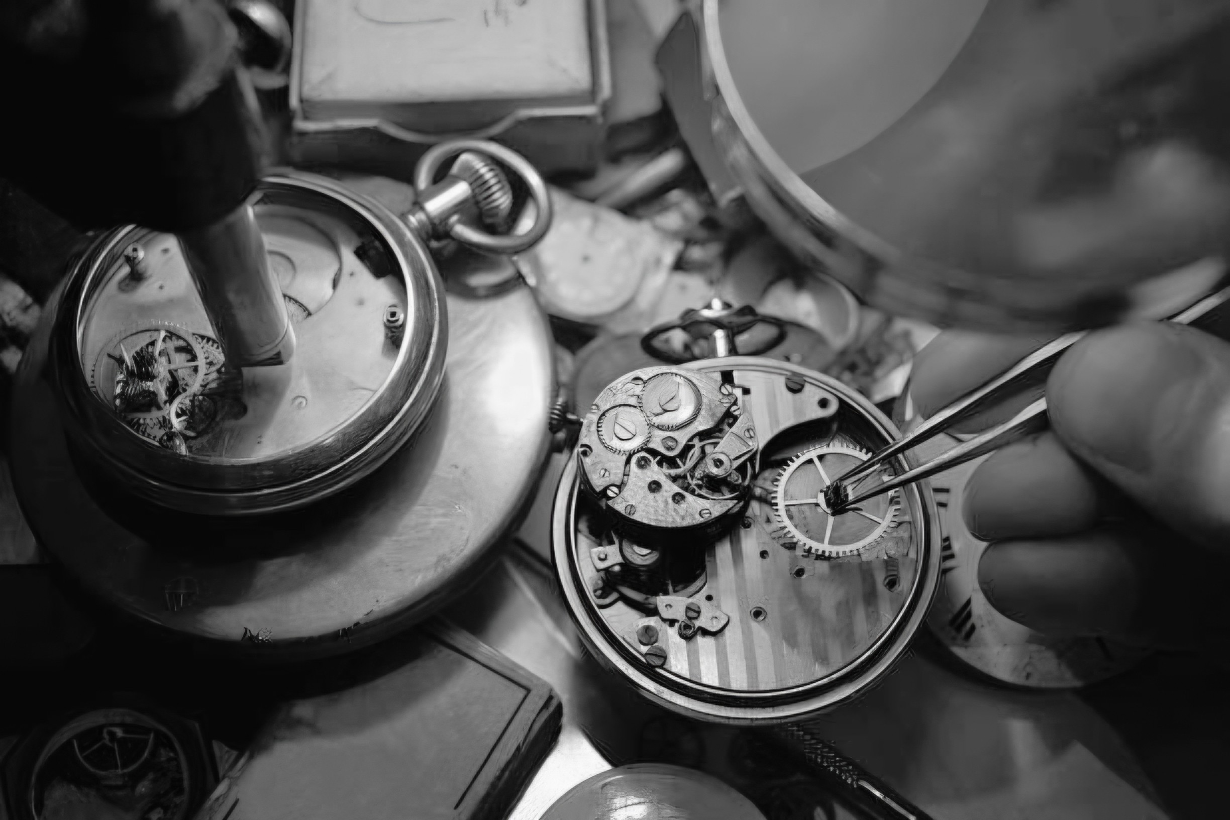 Close up of watch mechanisms being assembled