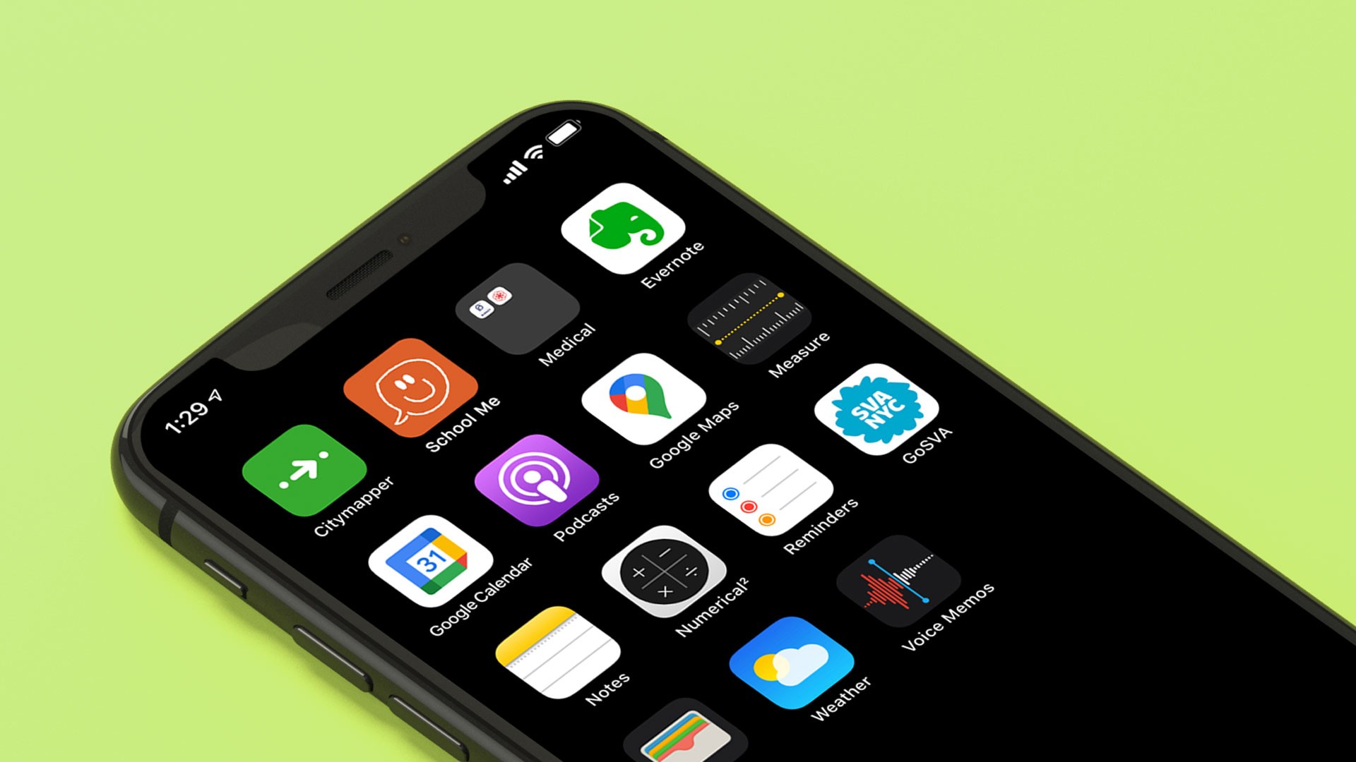 A black smartphone displays a grid of app icons on its screen against a light green background. The apps include "Citymapper," "School Me," "Medical," "Google Maps," "Measure," "GOSVA," "Podcasts," "Reminders," "Numerical," and "Voice Memos." The time displayed on the phone is 1:29:4.