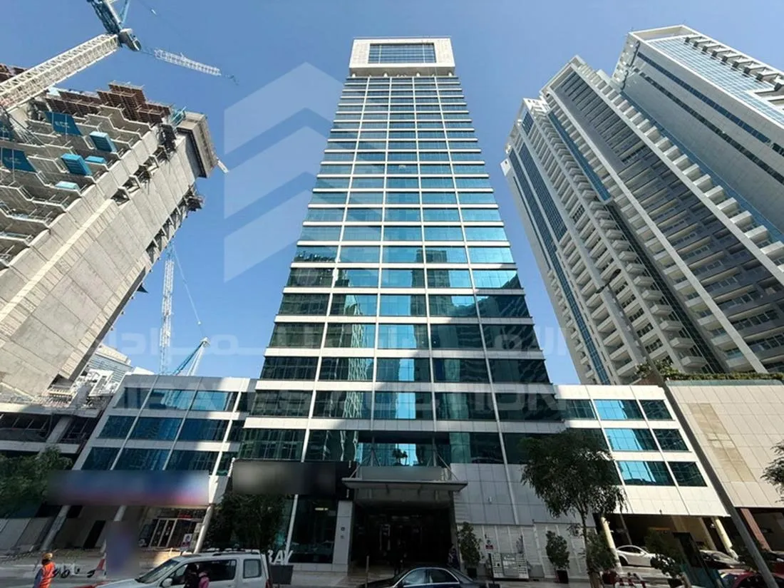 Ground entrance of Clover Bay Tower, featuring high-end commercial spaces managed by expert agents.