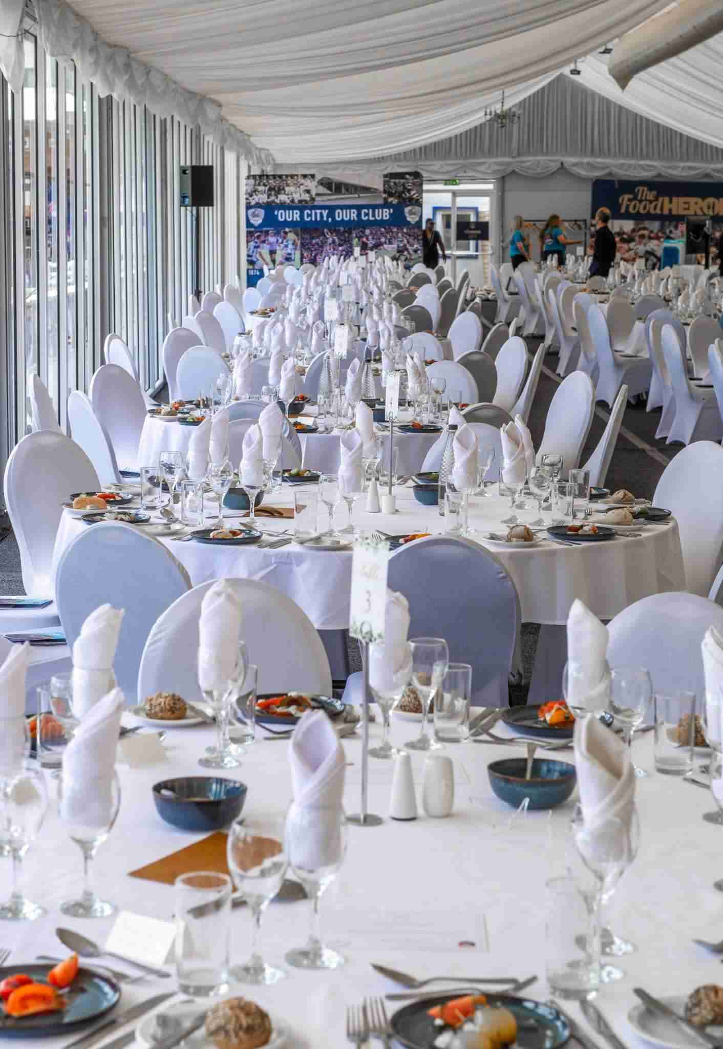 A close up of a person holding the hand of another person