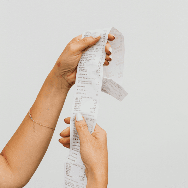 person holding a receipt