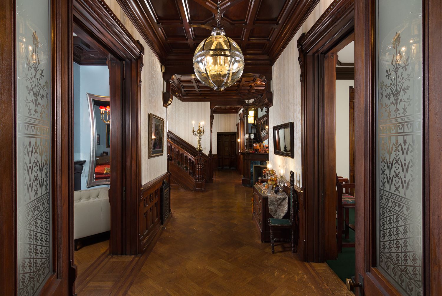 nfinity pool blending into the ocean view, minimalist sun loungers in soft neutral fabric, curved architecture