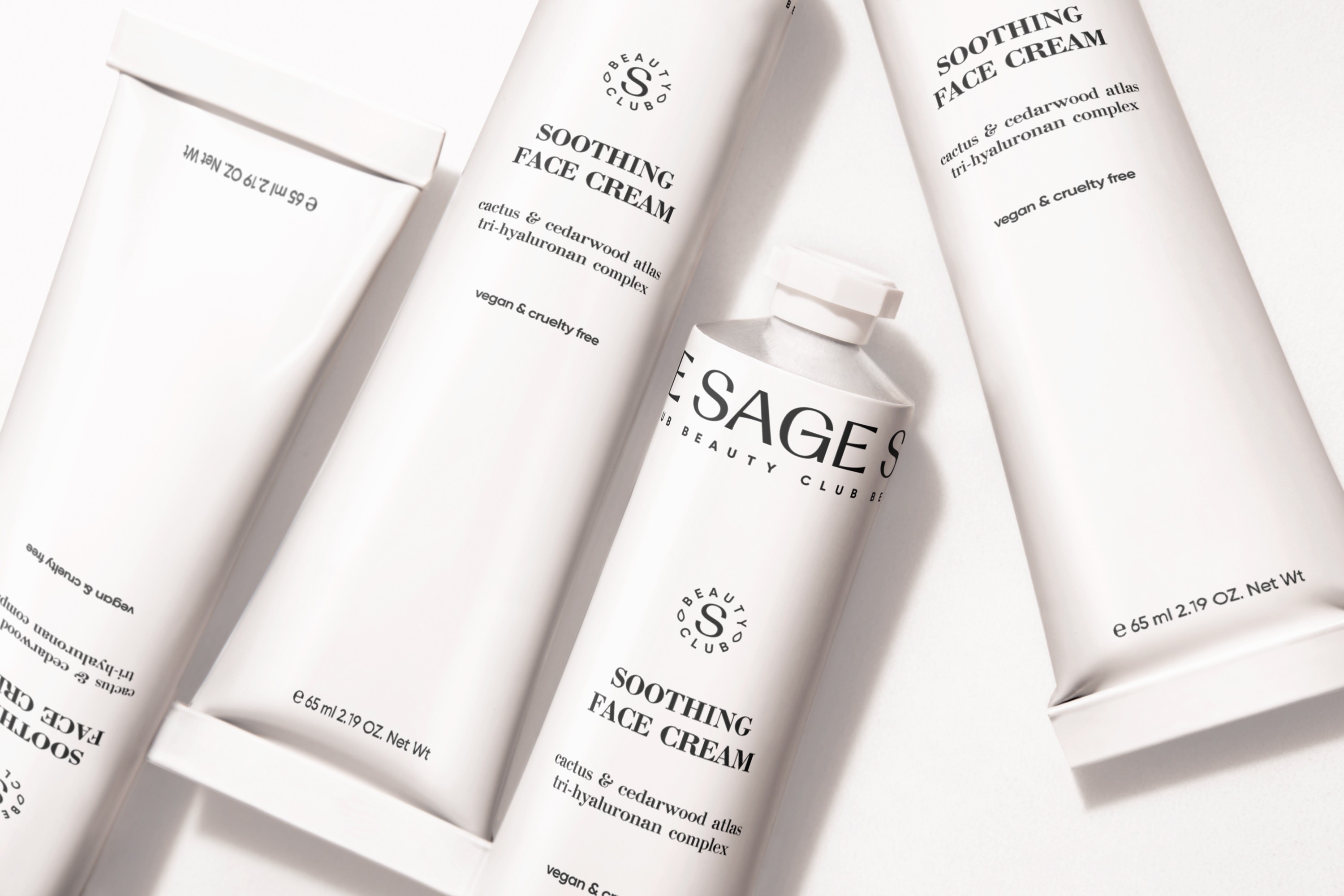 Streetside billboard with flyposters of the Batch.Works brand and illustrations