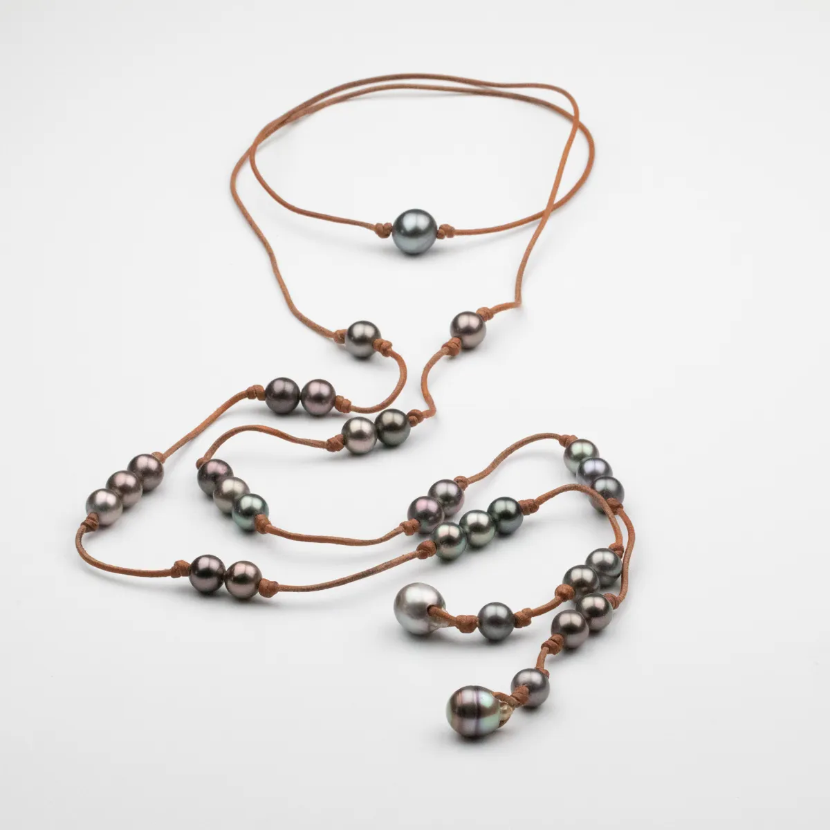 Tahitian Pearl necklace with round and baroque drop pearls hand-knotted on natural leather cord — Manos de Oro Saint Barth
