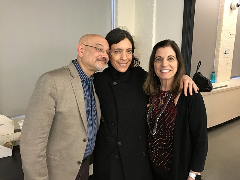 portrait of two women and a man