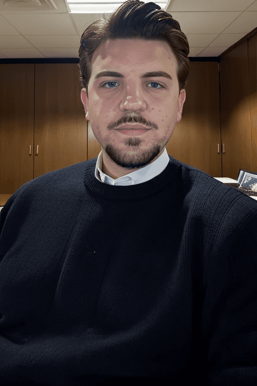 Profile portrait of a man in a white shirt against a light background