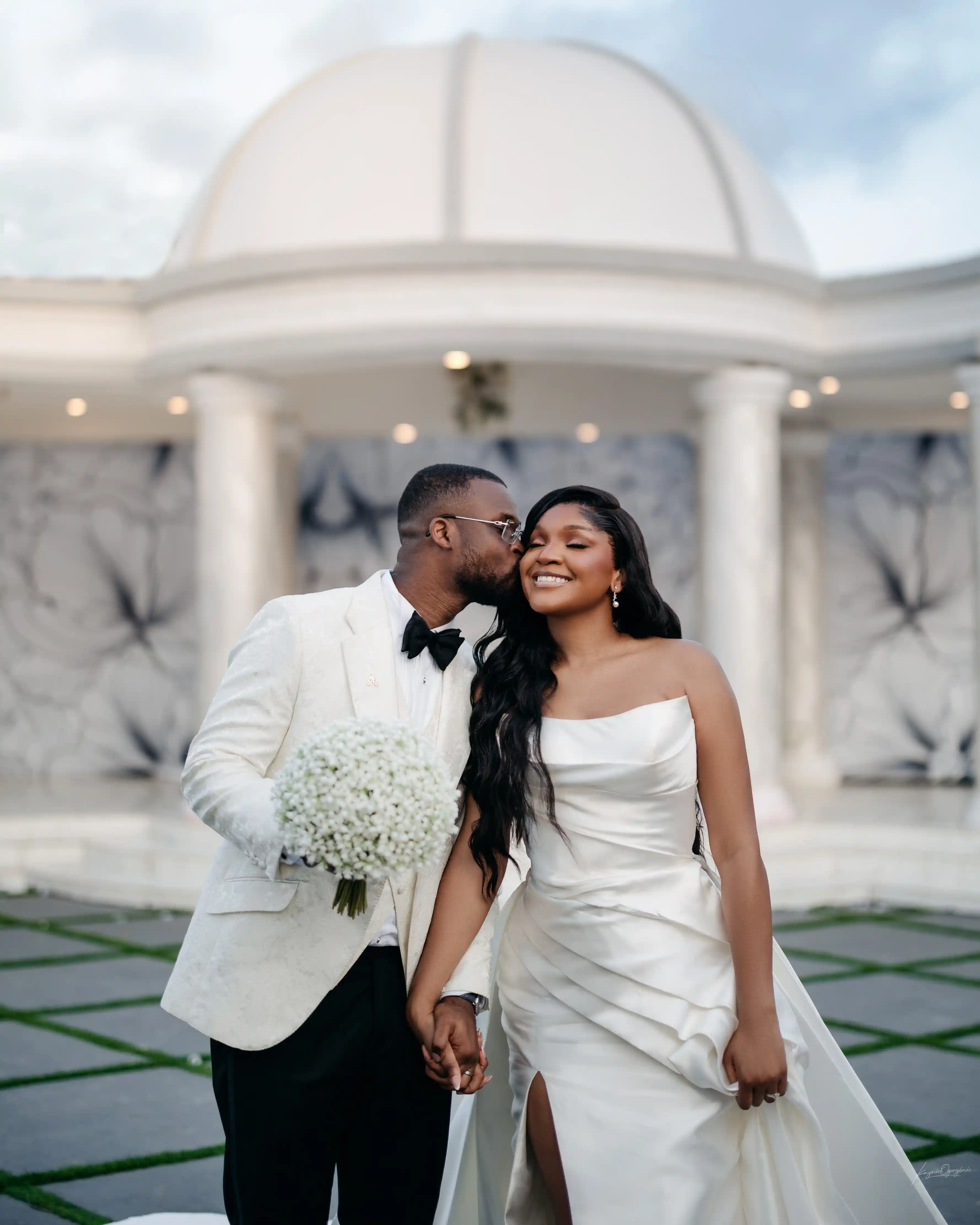 Bride and groom celebrating a luxury wedding coordinated by Victoria Brooks Events, a premium wedding planner in Nigeria.