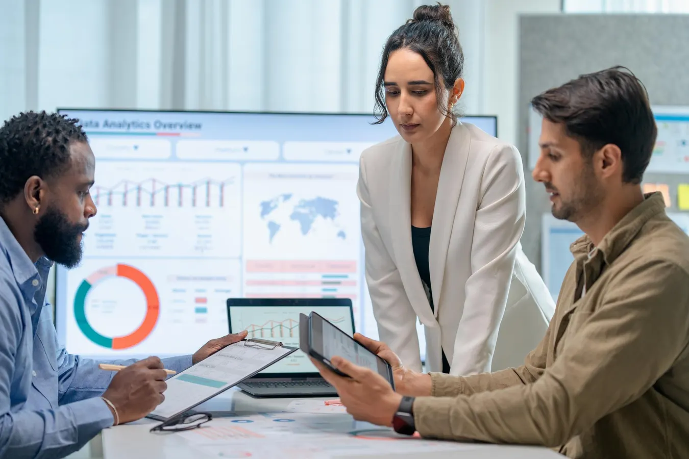 Marketing and operations team analyzing compliance documents and financial data for TikTok Shop entity transfer.