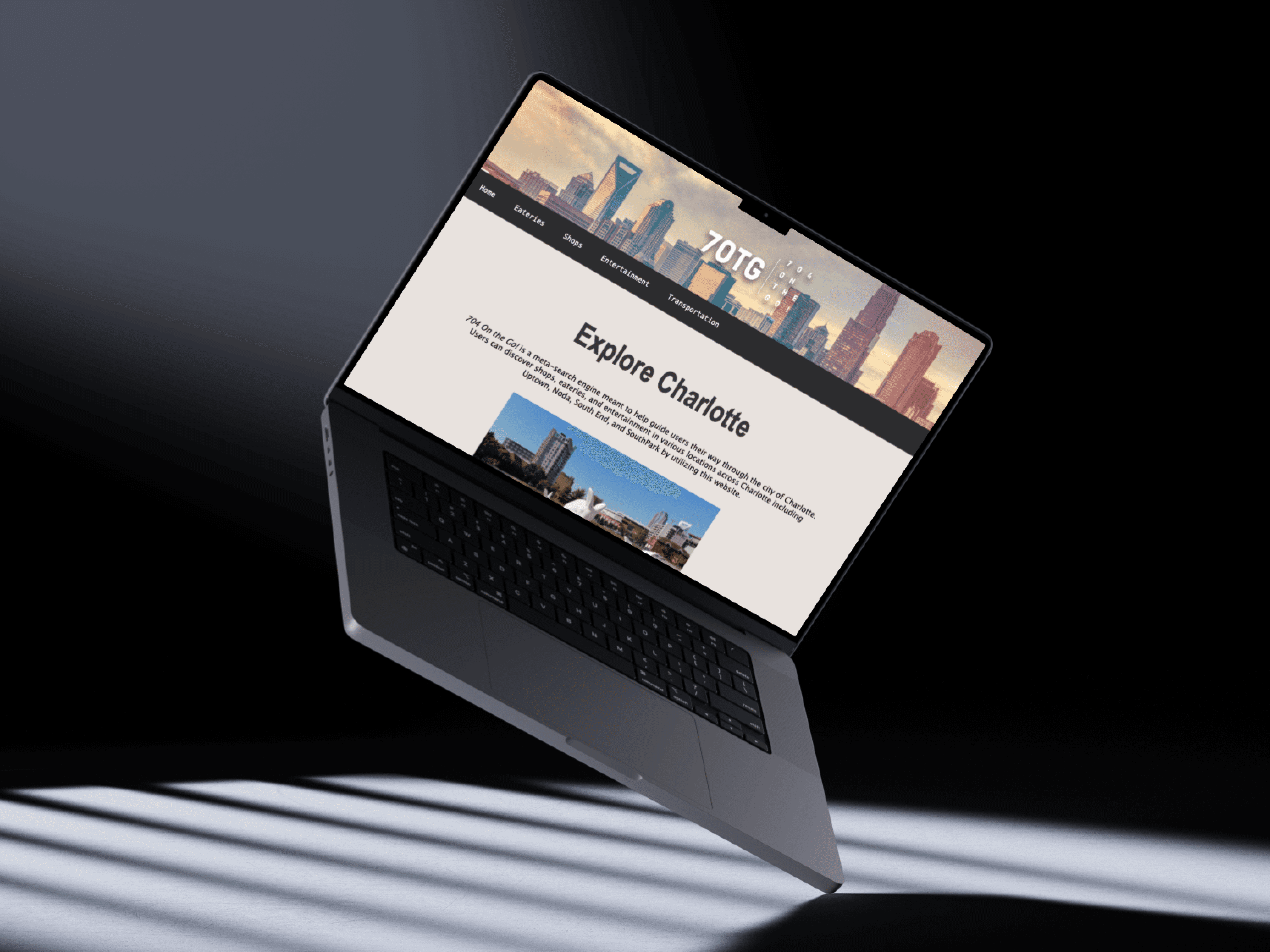 Mockup of a laptop with the 704OTG! landing page