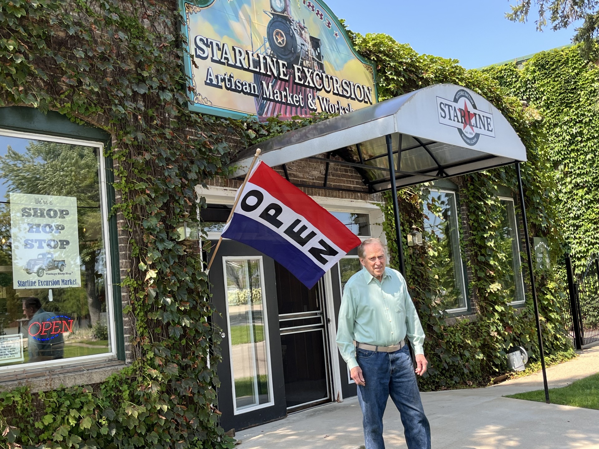 Scott Summers standing outside the Starline Factor Building and Artisan Market in Harvard, IL