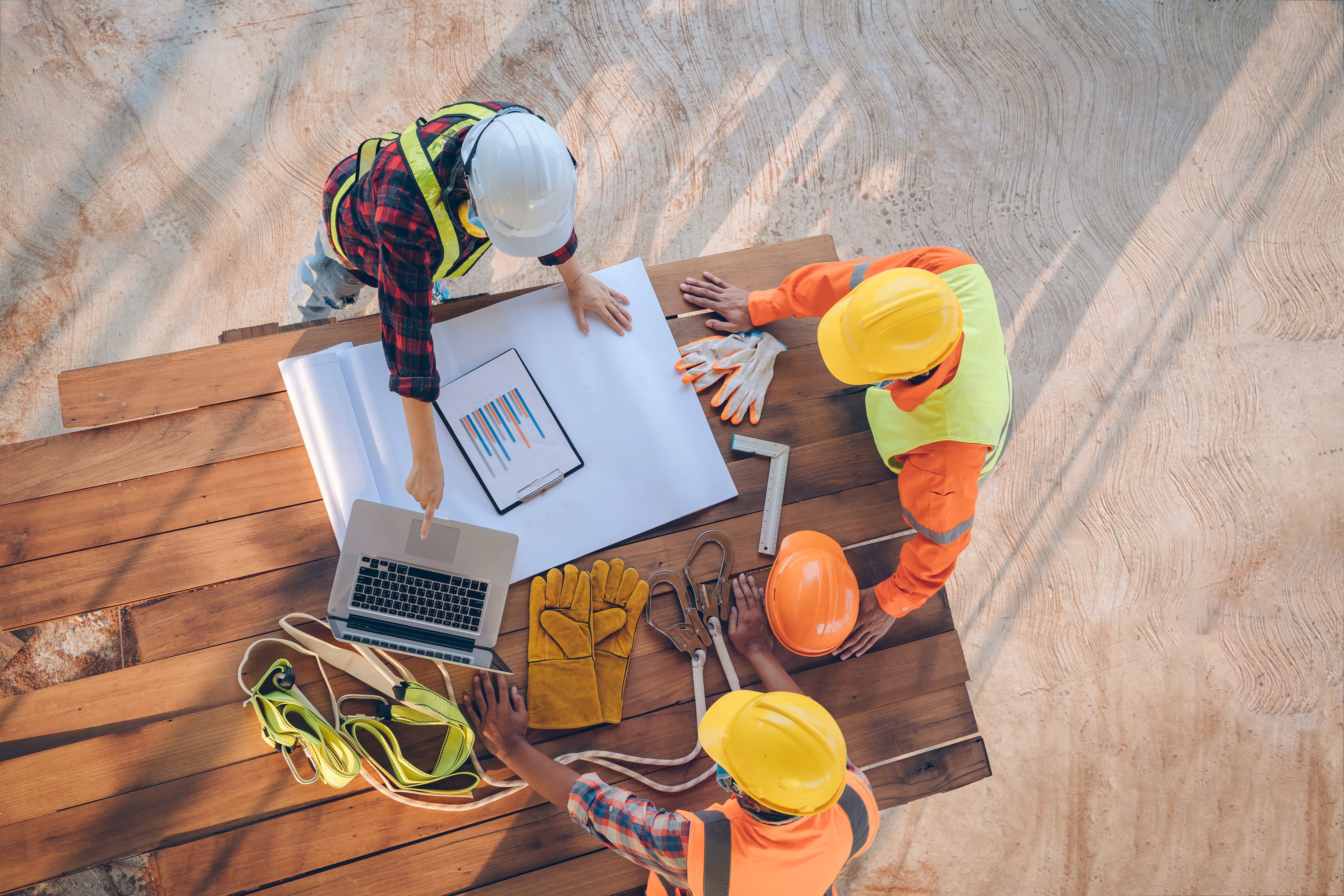 woman on a construction site holding a tablet