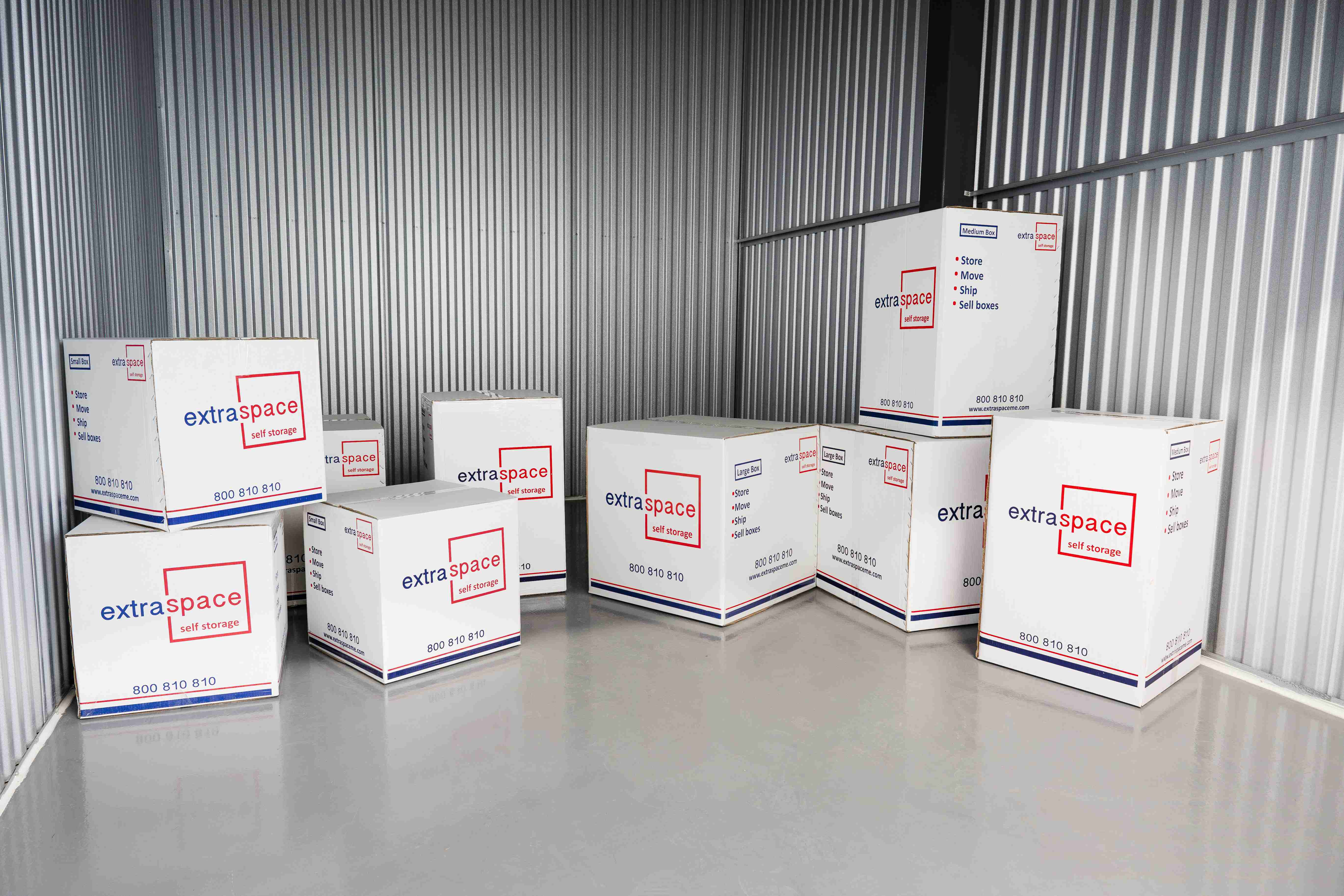 Labeled boxes stacked neatly inside a unit at Extra Space storage facility Dubai.