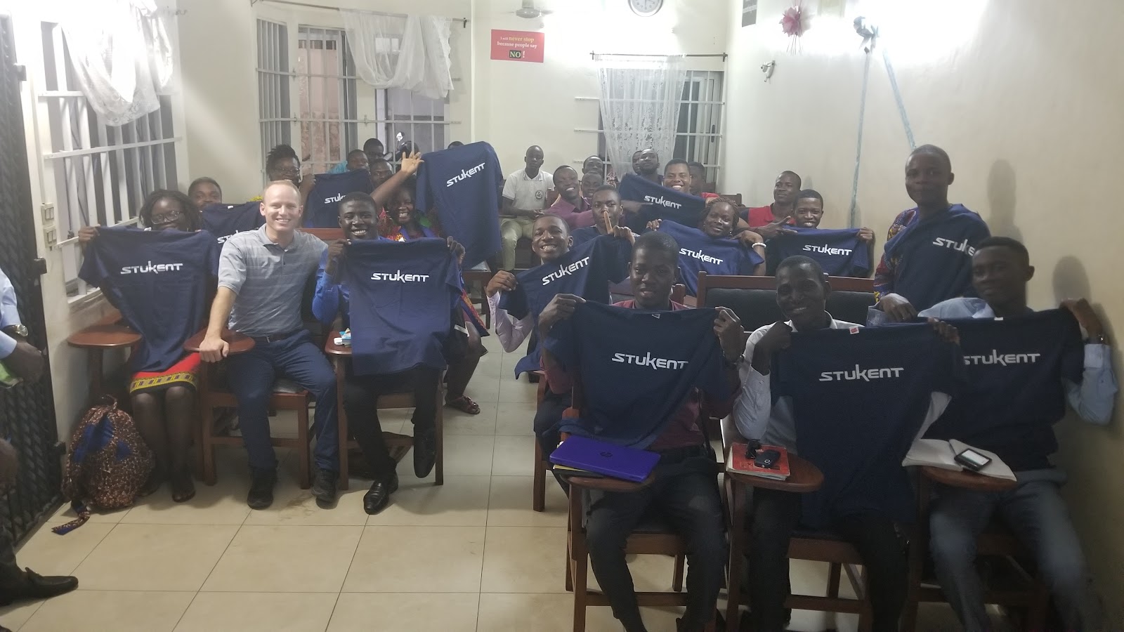 Stukent CEO Stuart Draper with one of the VELI classes in Benin. 