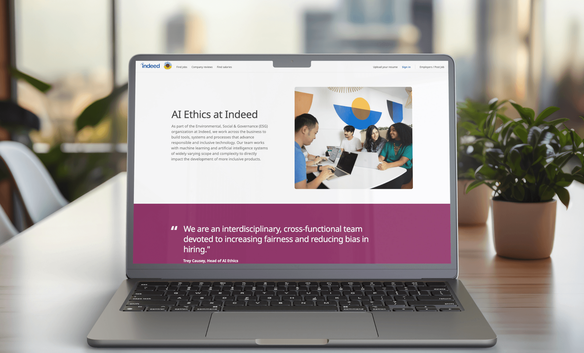 Indeed AI Ethics webpage displayed on a laptop on a conference room table