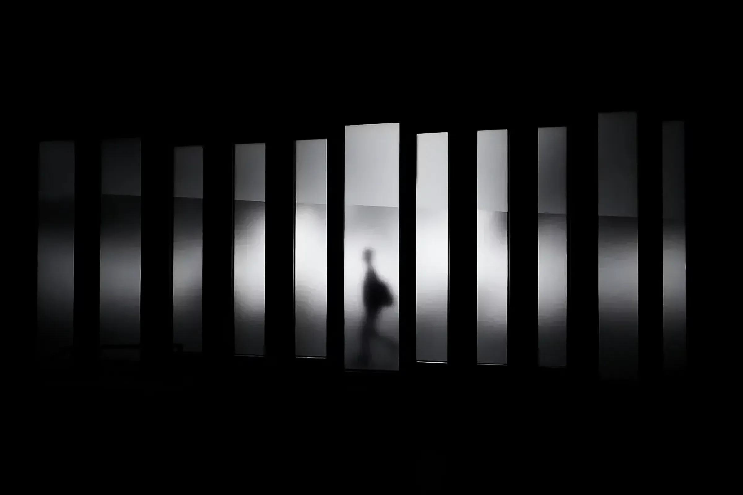 grayscale photo of a dark building