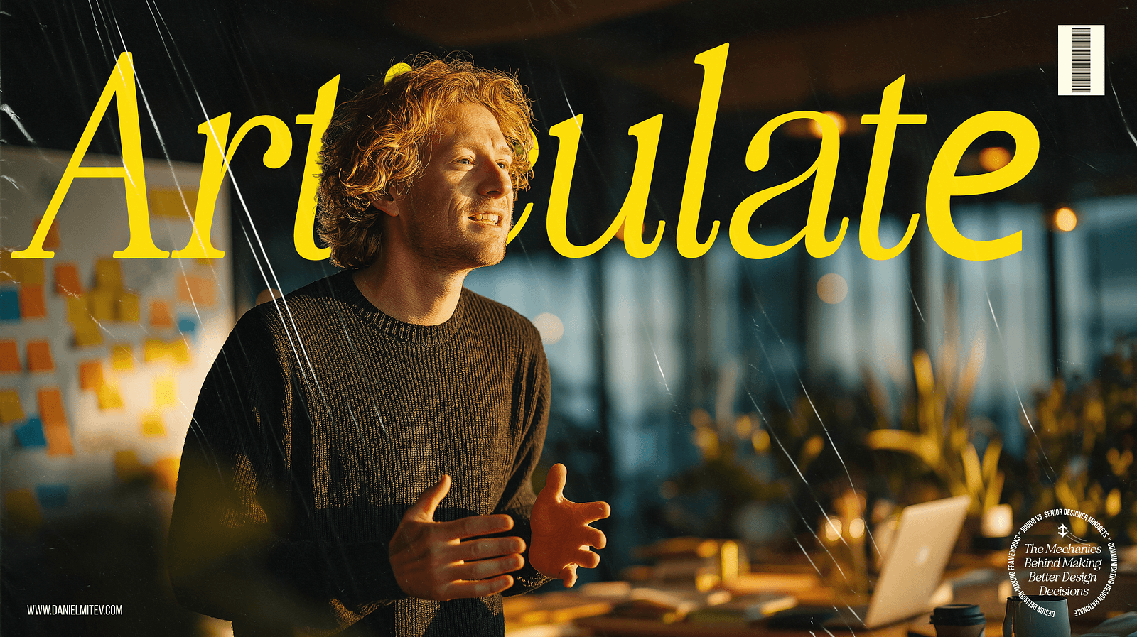 A male designer speaks passionately in a creative office space during golden hour, with the word “Articulate” in bold yellow typography across the image. Behind him are colorful sticky notes, a laptop, and warm lighting, emphasizing the importance of clearly communicating design decisions.