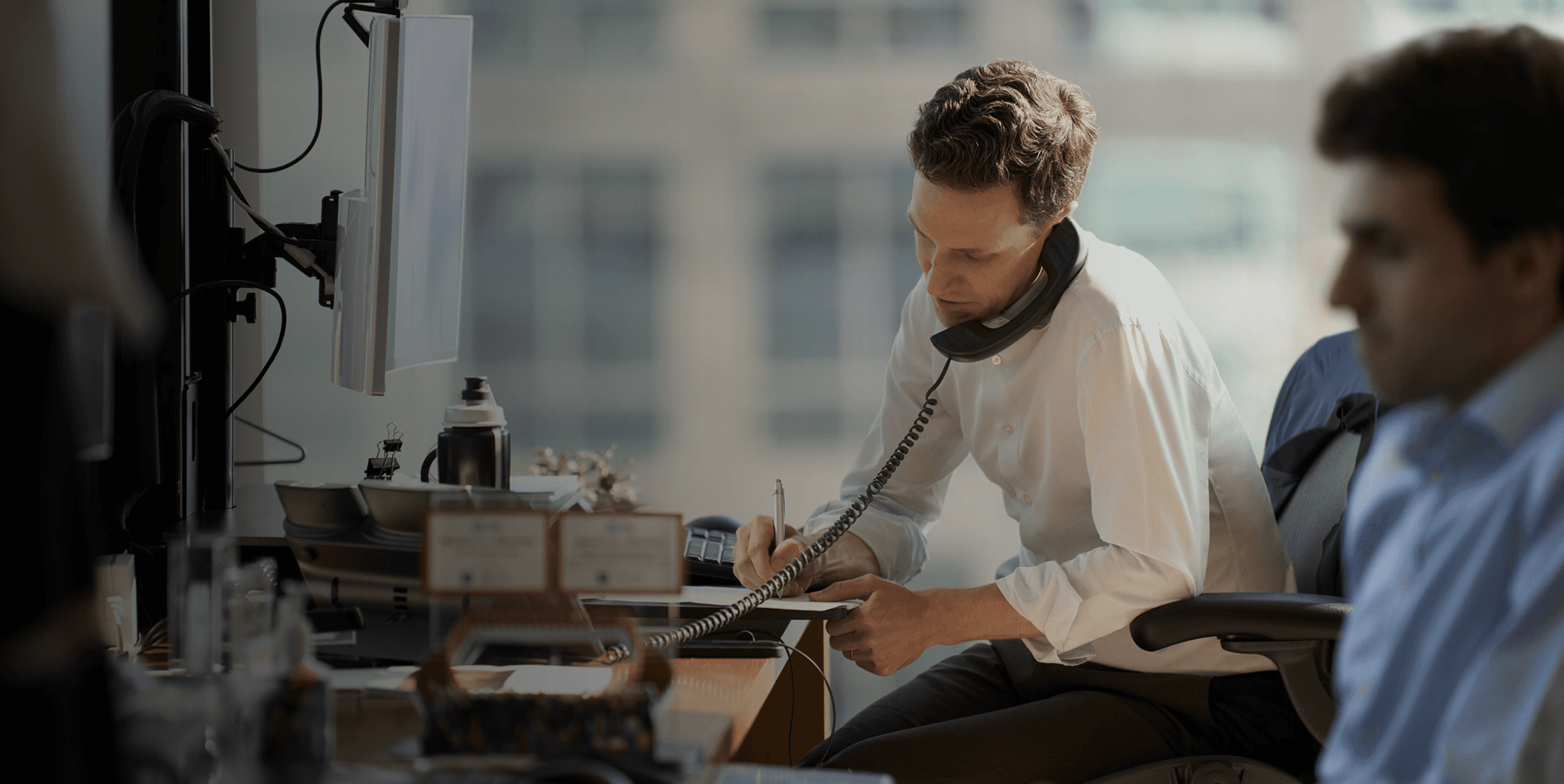 kids lying on a glass land and smiling