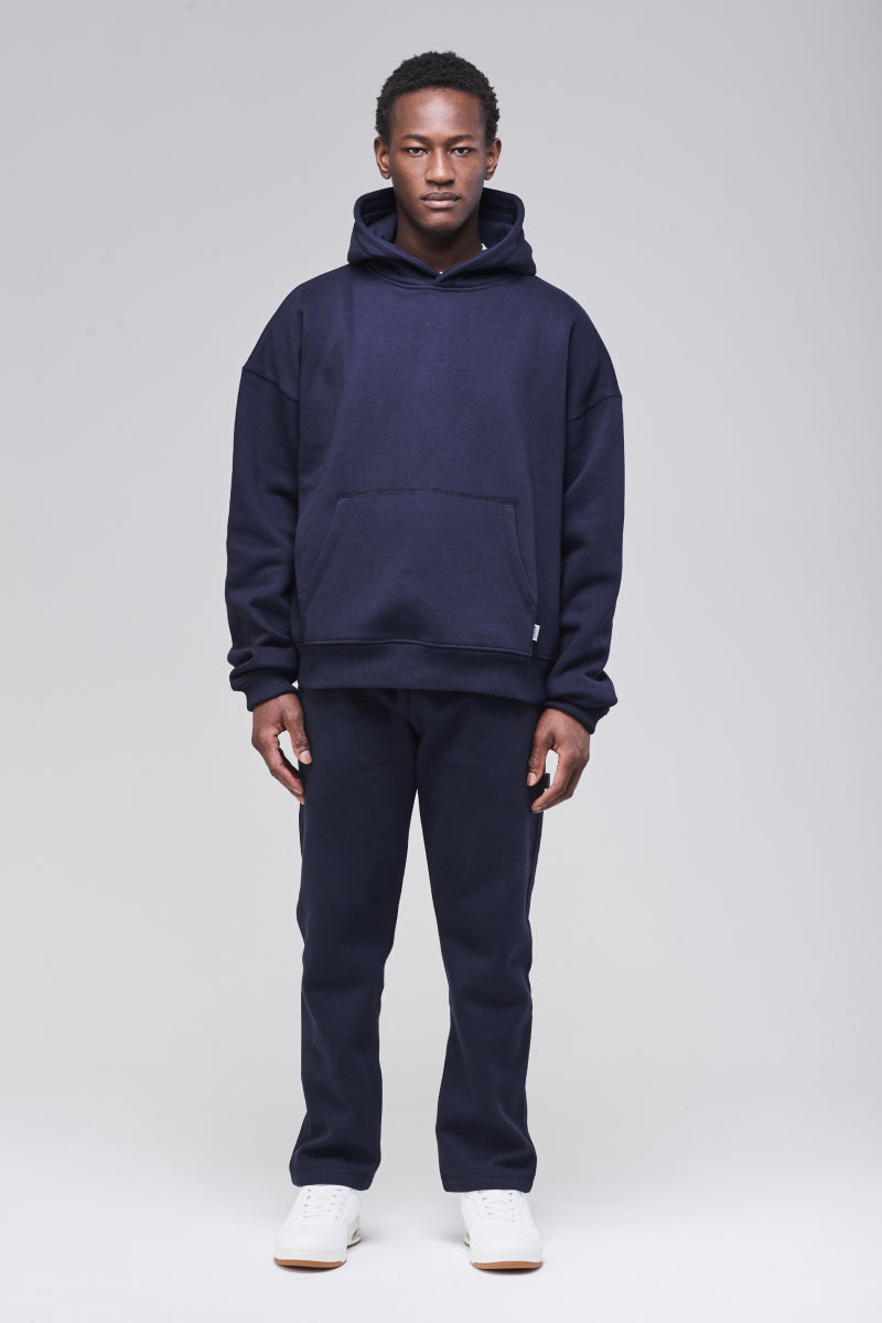 Sunday Superior Mercer Hoodie in rich navy, male model front view