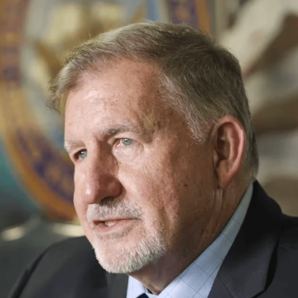 man wearing black crew-neck shirt