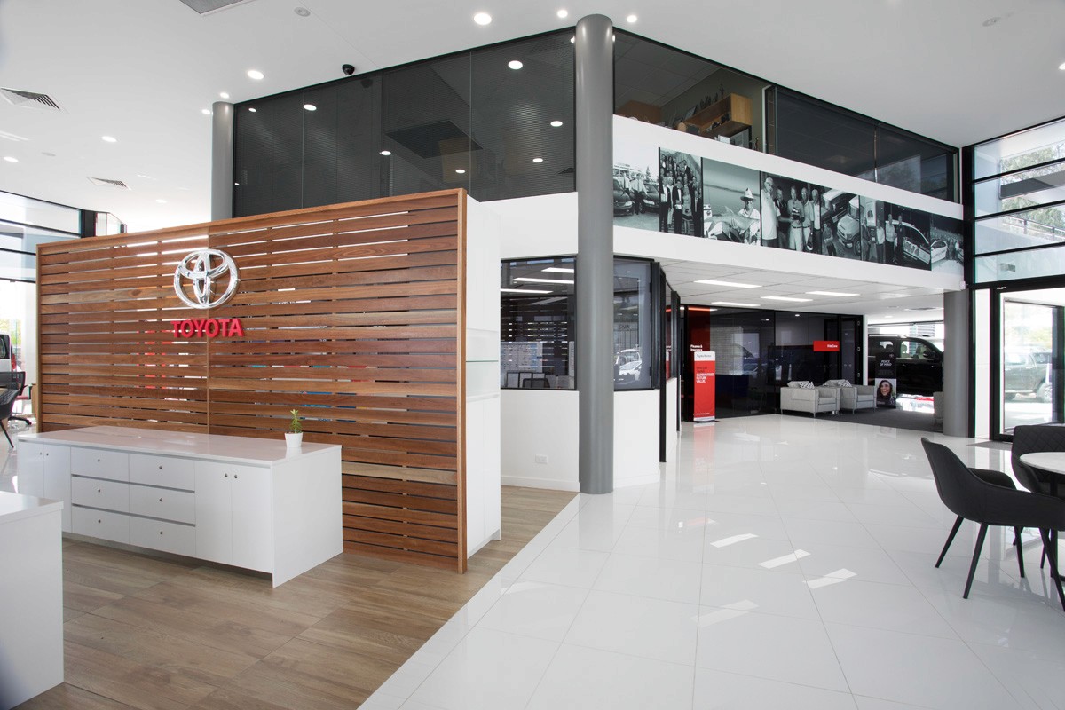 Greenhous Toyota showroom fit-out with timber slatted feature wall and bespoke display joinery