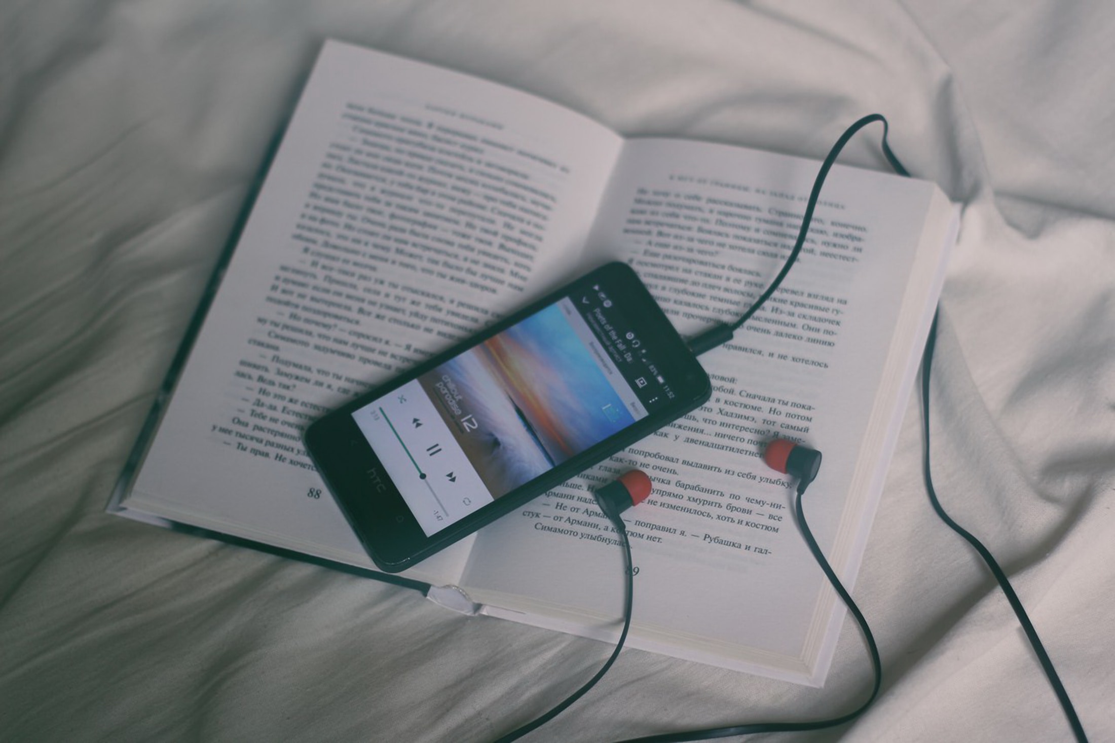 music being played on top of a book - how to make ai cover songs