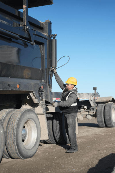 Rolas Truck Driver Holding Clipboard staring left