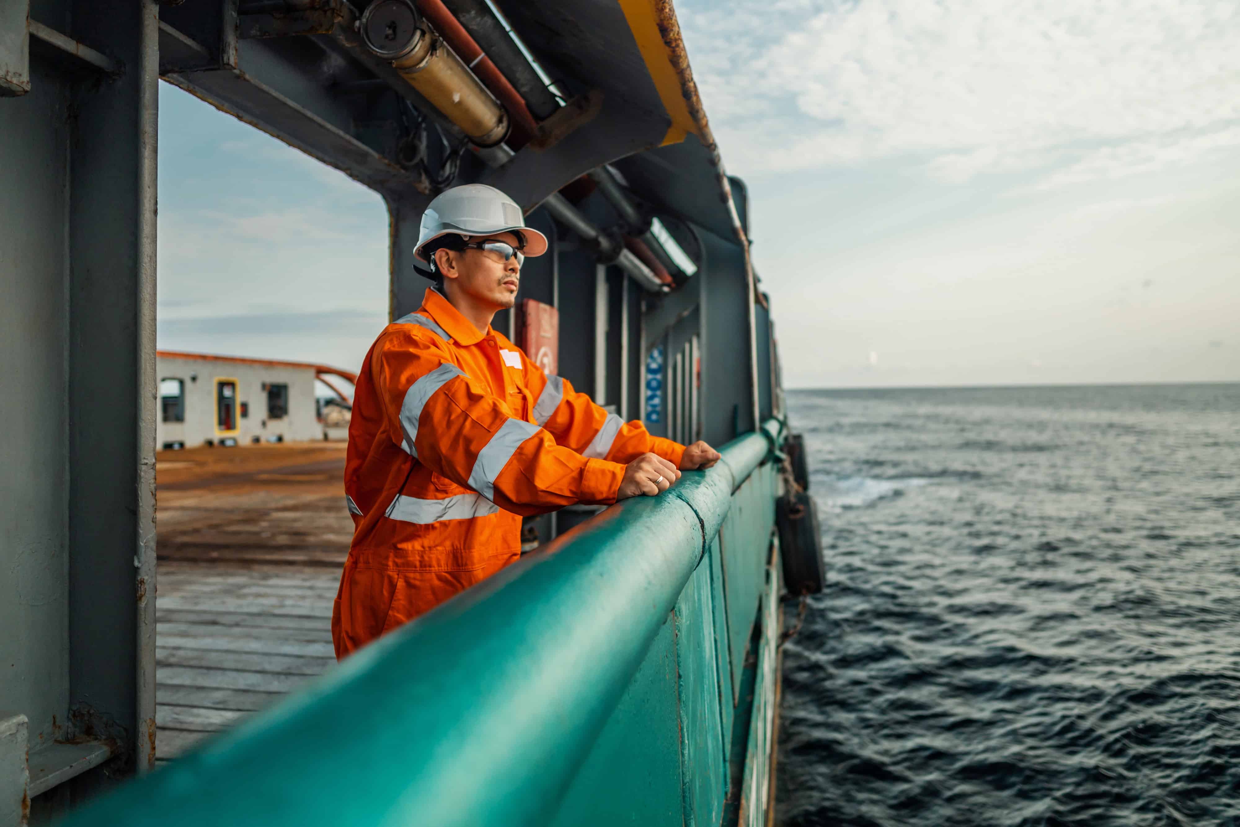 Seafarer dealing with extreme isolation in a remote location thinking about psychosocial risks