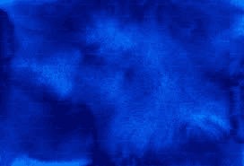 Abstract image featuring a deep blue textured background with varying shades and soft, swirling patterns.