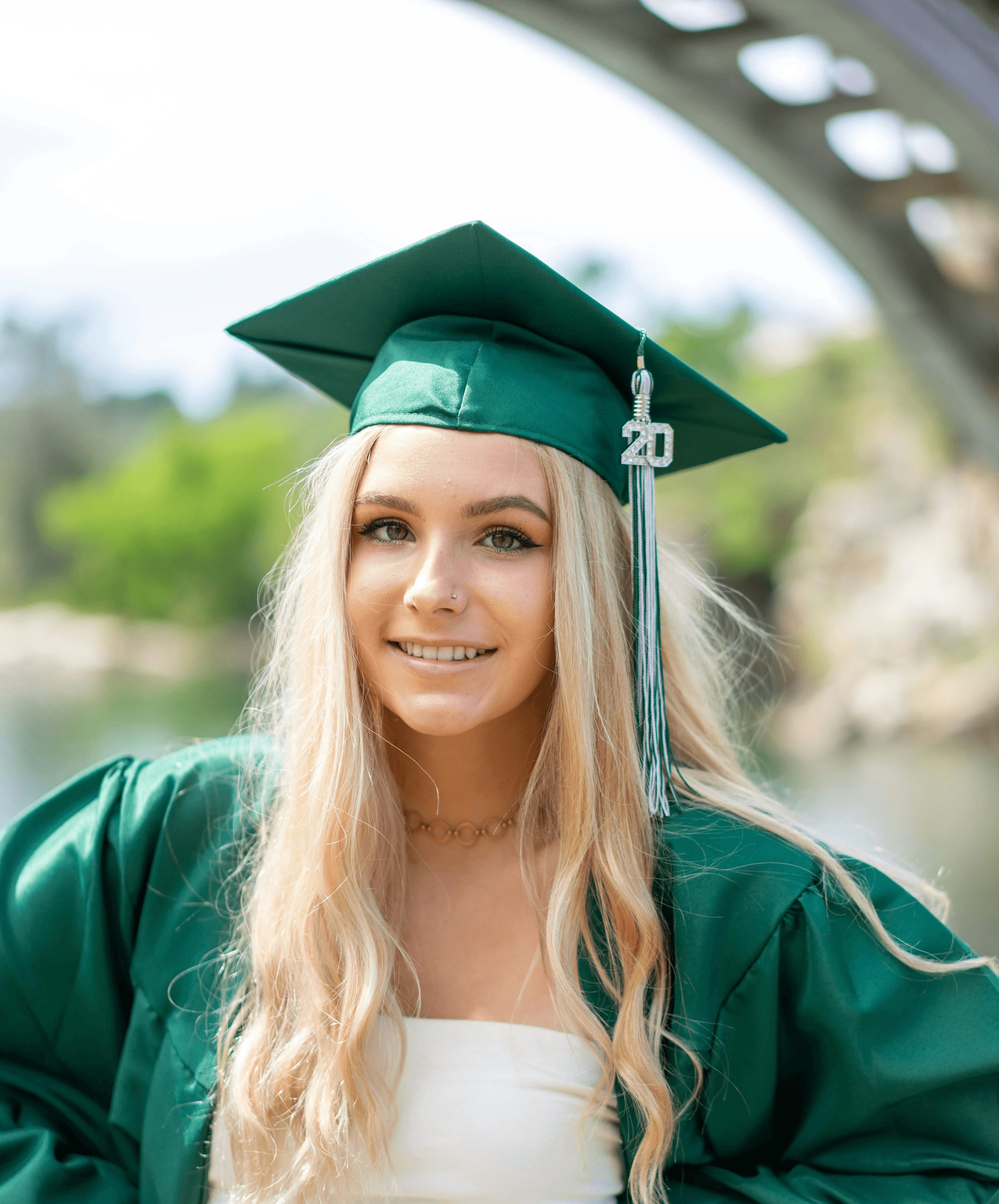 woman in green academic gown