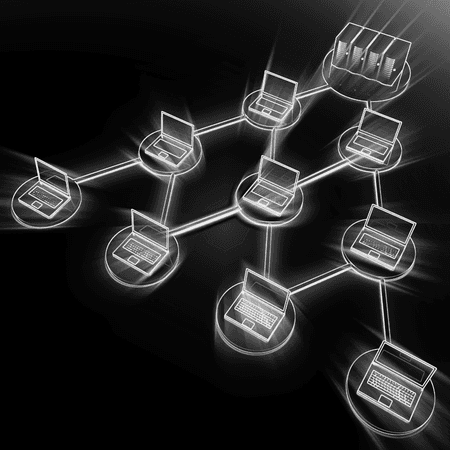 man sitting while having coffee and using laptop