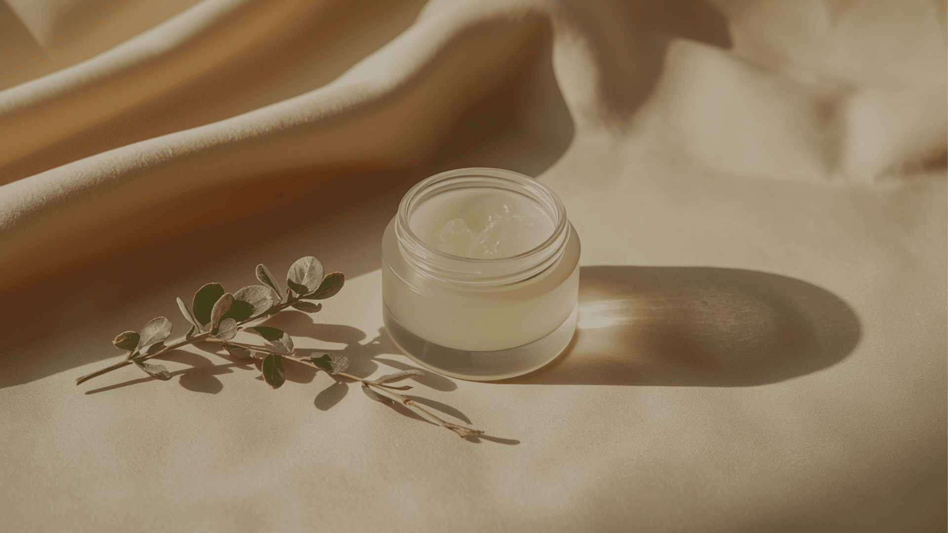 vaseline jar on a beige drape